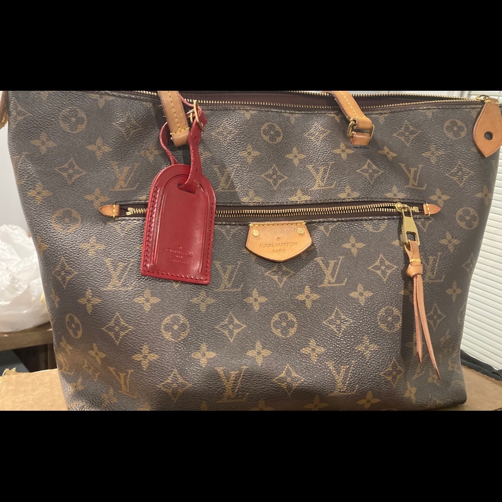 Authentic Louis Vuitton red id tag